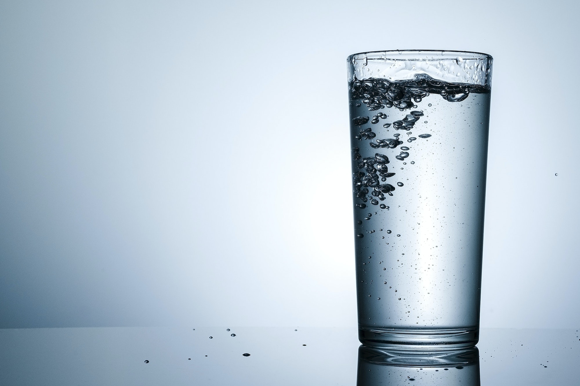 Tall tumbler filled with sparkling water